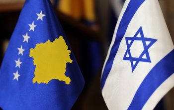 Flags for the Republic of Kosovo and Israel stand next to each other during an official ceremony for the opening of the Kosovar Embassy in Jerusalem on March 15, 2021.
