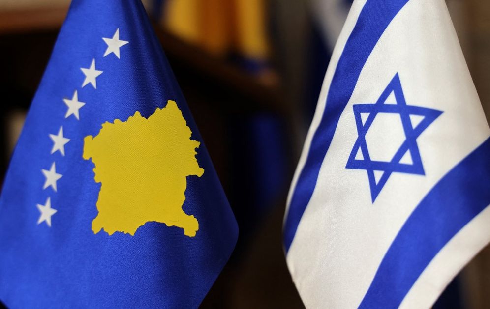 Flags for the Republic of Kosovo and Israel stand next to each other during an official ceremony for the opening of the Kosovar Embassy in Jerusalem.