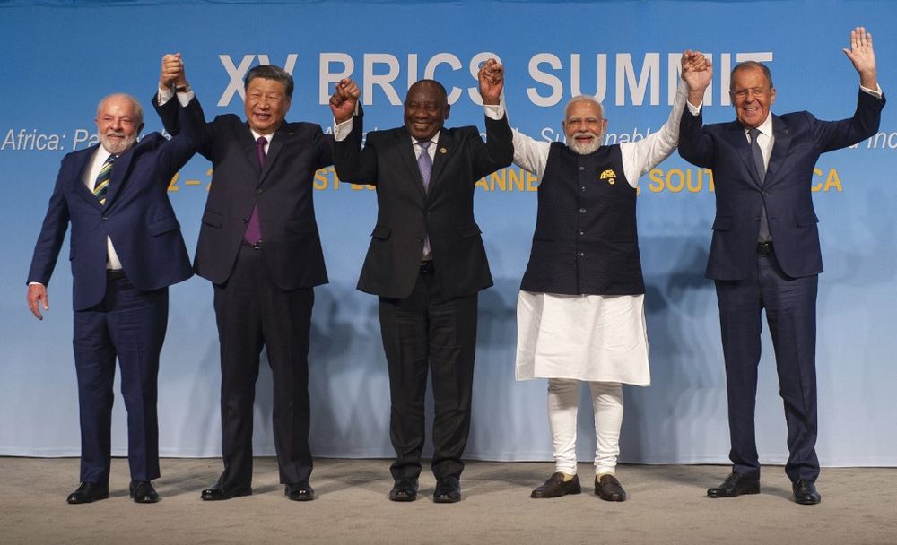 Brazil's President Luiz Inacio Lula da Silva (L), China's President Xi Jinping, South African President Cyril Ramaphosa, Indian Prime Minister Narendra Modi and Russia's Foreign Minister Sergei Lavrov at the BRICS Summit in Johannesburg.