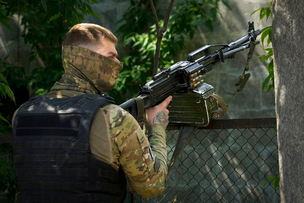 Russian soldier guards an administrative area of Khersonvodokanal in Kherson, Kherson region, south Ukraine.