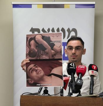 Kidnapping survivor Rom Braslavsky speaking at the October Council press conference on May 11, 2026