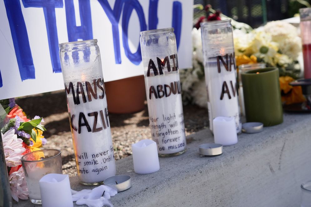 (AP Photo/Ty Oneil) Candles with victims names are placed outside the Islamic Center of San Diego in the aftermath of a shooting on Wednesday, May 20, 2026, in San Diego.