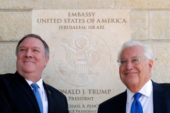 U.S. Secretary of State Mike Pompeo and U.S. Ambassador to Israel David Friedman stand next to the dedication plaque at the U.S. embassy in Jerusalem, Wednesday, March 21, 2019. Jim Young/ AP