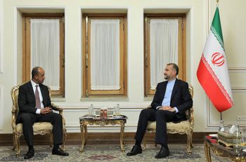 Iran's Foreign Minister Hossein Amir Abdollahian (R) meeting with Bader Abdullah Al-Munaikh, Kuwait's newly-appointed ambassador to Iran, in Tehran on August 13, 2022.