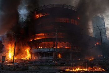 A trade center burns after a Russian strike on Kyiv, Ukraine, on Sunday, May 24, 2026