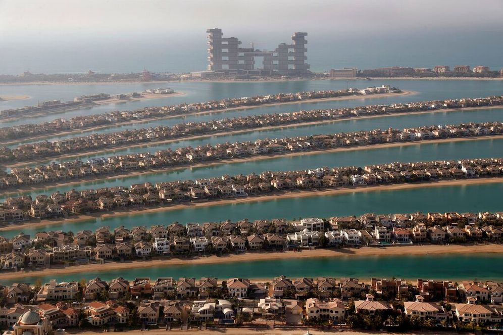 (AP Photo/Kamran Jebreili) Villas on the fronds of the Jumeirah Palm Island are seen from the observation deck of The View at The Palm Jumeirah, in Dubai, United Arab Emirates.