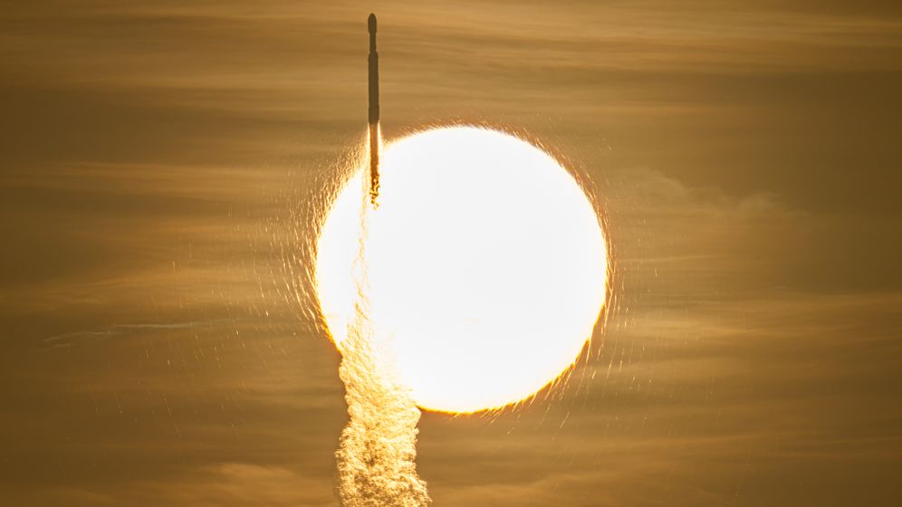 Photo Credit: (NASA/John Kraus) A SpaceX Falcon Heavy rocket with NASA’s Nancy Grace Roman Space Telescope on board is seen transiting the sun during launch from Launch Complex 39A, Sunday, Aug. 30, 2026