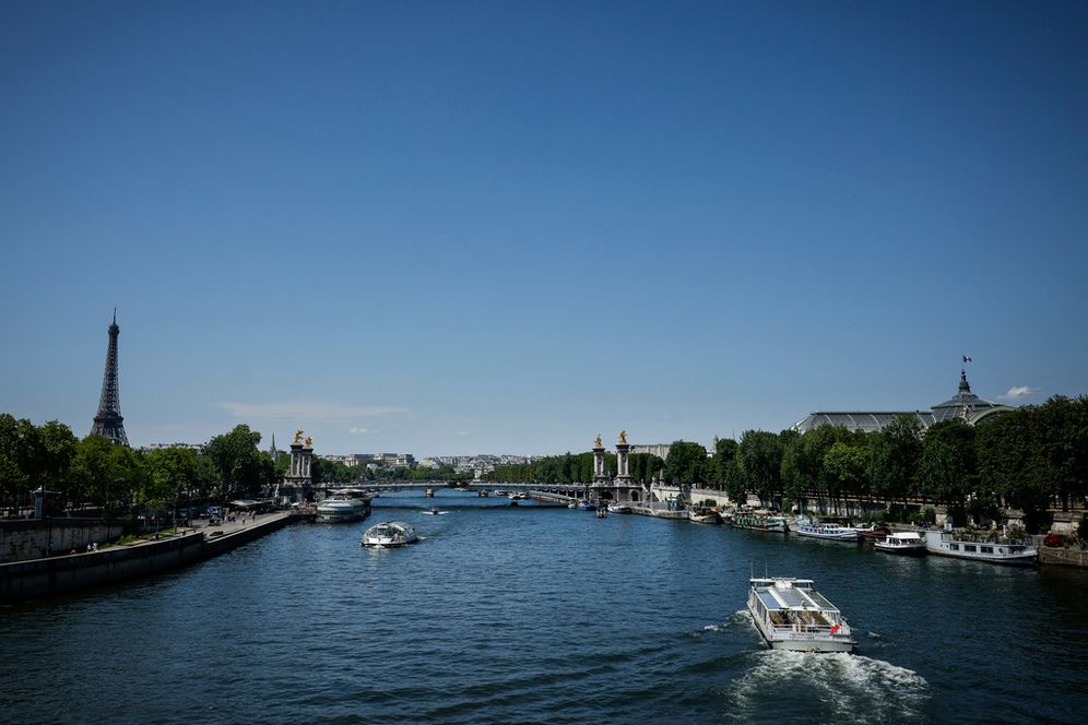 The Alexandre III bridge, the Eiffel Tower and the Grand Palais monument, right, are pictured in Paris, Saturday, July 8, 2023.
