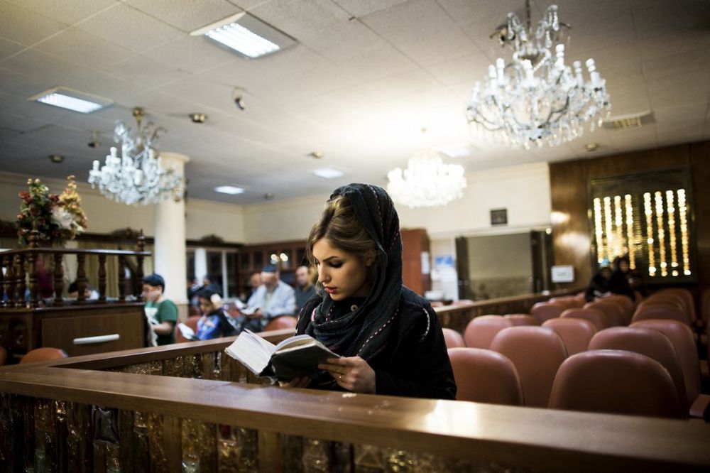 A Jewish woman prays at the Abrishami Synagogue in Tehran, Iran, on November 28, 2013.