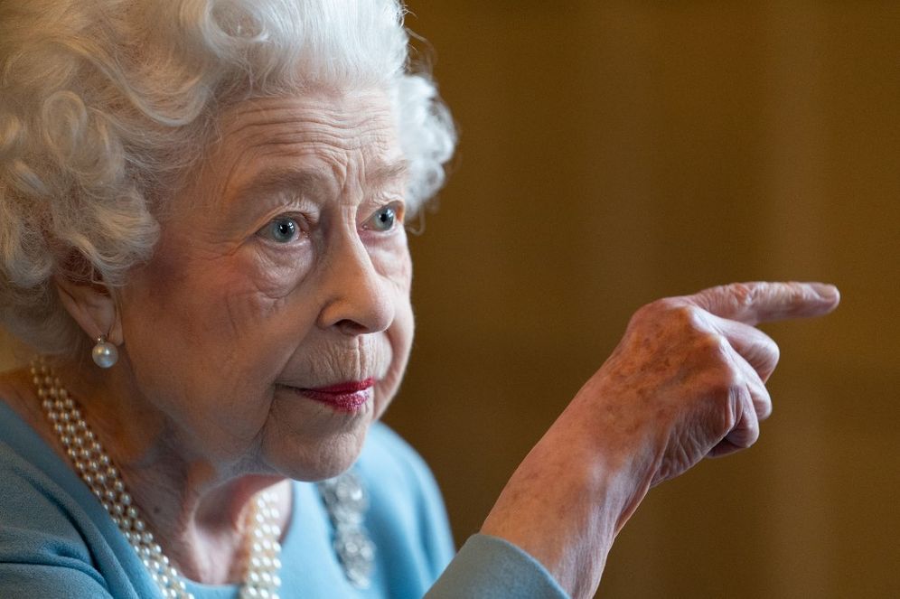 Britain's Queen Elizabeth II gestures during a reception in the Ballroom of Sandringham House, the Queen's Norfolk residence in the United Kingdom on February 5, 2022, as she celebrates the start of the Platinum Jubilee.