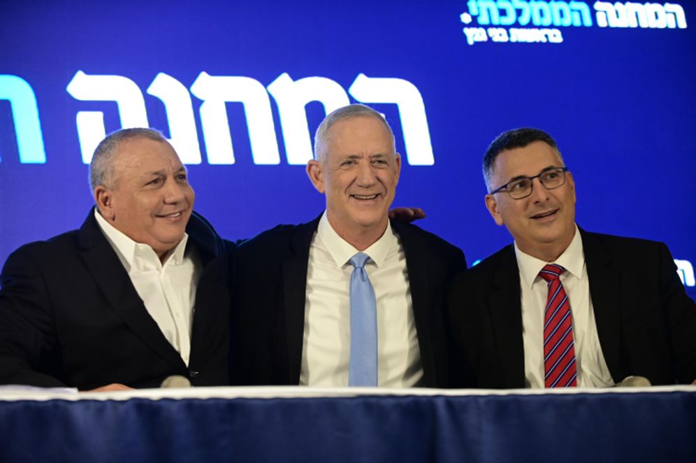 Tomer Neuberg/Flash90 The leader of the Blue and White party, Benny Gantz, the leader of the New Hope party, Gideon Saar, and Gadi Eizenkot hold a press conference in Ramat Gan on August 14, 2022