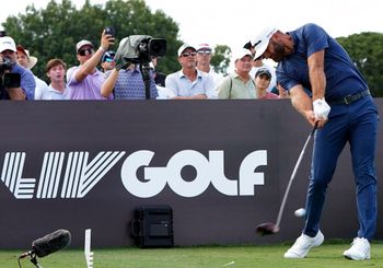 Golfer Dustin Johnson hits during the LIV Golf Team Championship in Florida, the United States.