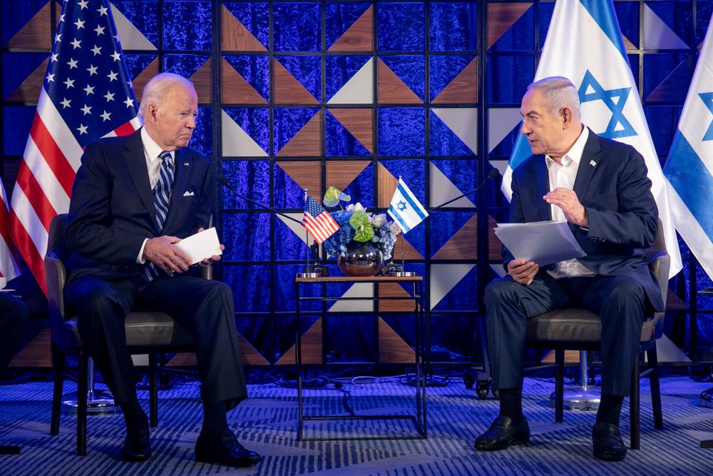 U.S. President Joe Biden sits with Israeli Prime Minister Benjamin Netanyahu in Tel Aviv, Israel.