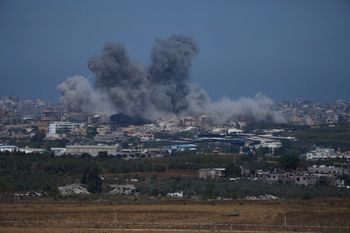 Smoke rises following an Israeli airstrike in the Gaza Strip, as seen from southern Israel, Friday, May 17, 2024.