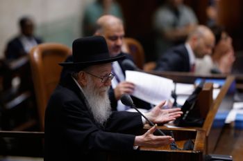 Resigning MK Yaakov Litzman speaks at the Israeli parliament during a plenum session in the assembly hall of the Israeli parliament, in Jerusalem, on June 1, 2022.