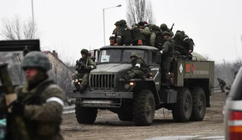 AFP / Konstantin Mihalchevskiy / Sputnik An undated photo showing the entry of Russian soldiers into Ukraine, at an undisclosed location.