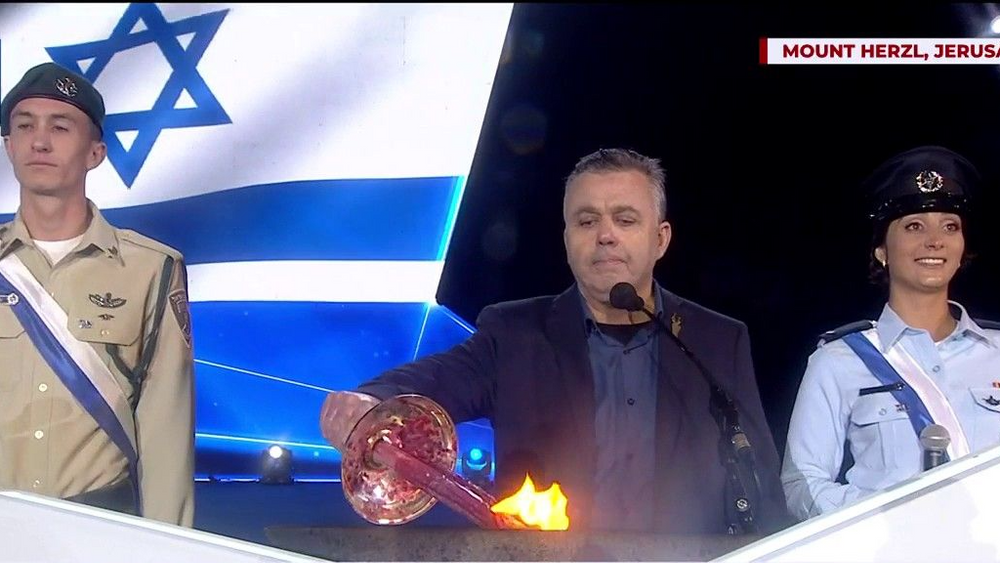 Lt. Col. (res.) Munir Madi lights the torch on Israel's Independence Day on May 4, 2022.