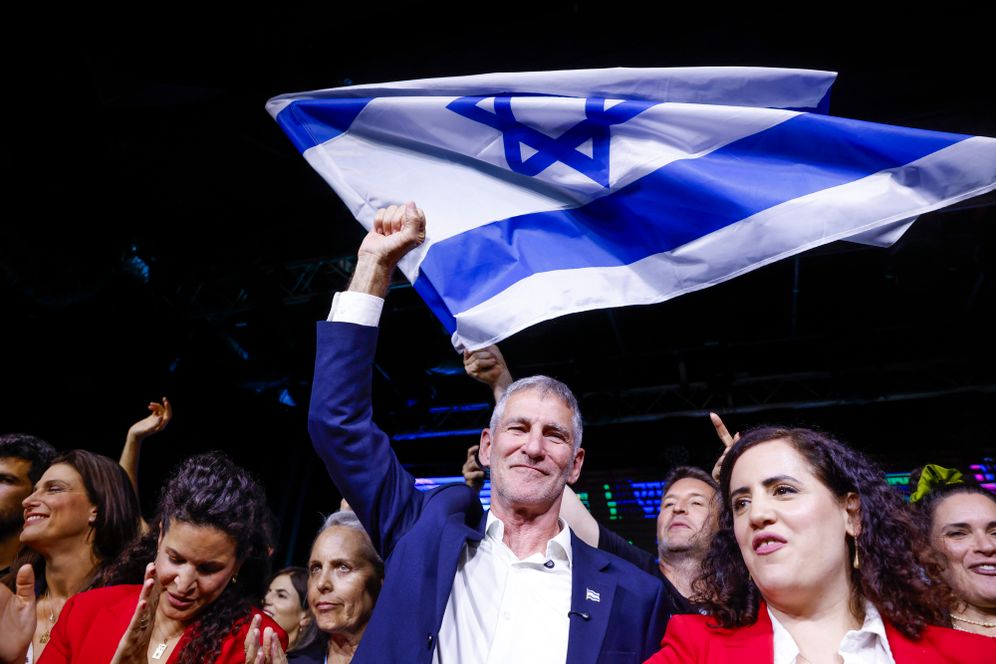 Photo by Yehoshua Yosef/Flash90 Democrats party chairman Yair Golan and members of his party celebrate at the party’s election headquarters in Tel Aviv, following the release of exit poll results on Israel’s general election night, October 27, 2026.