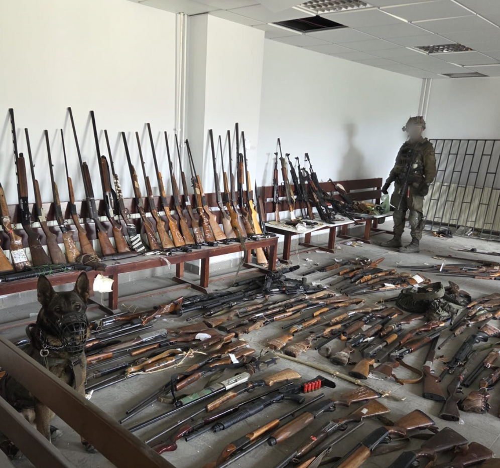 IDF seizes cache of 130 Hezbollah weapons, including rifles and pistols, hidden inside a southern Lebanon school