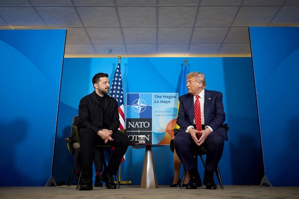 Ukraine's President Volodymyr Zelensky (L) meets with US President Donald Trump in The Hague, June 25, 2024.