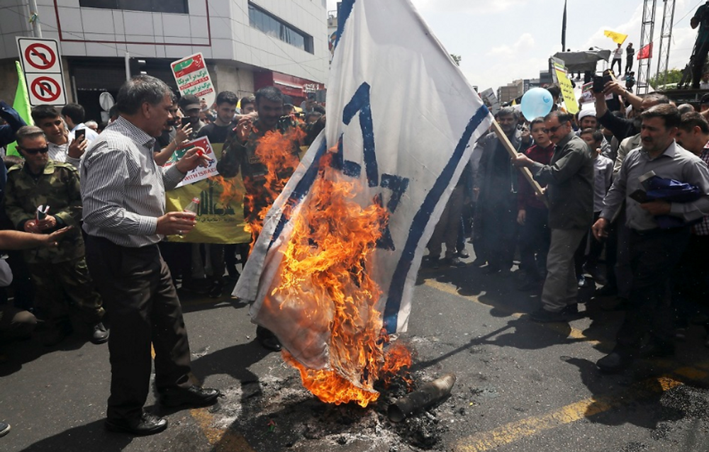 أعلام إسرائيلية تحترق في إيرانفي يوم "القدس العالمي"  بتاريخ 31.05.2019