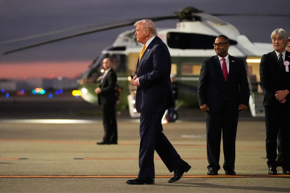 AP Photo/Mark Schiefelbein President Donald Trump walks on the tarmac of Haneda Airport upon his arrival after he stepped off Air Force One in Tokyo, Japan, Monday, Oct. 27, 2025.