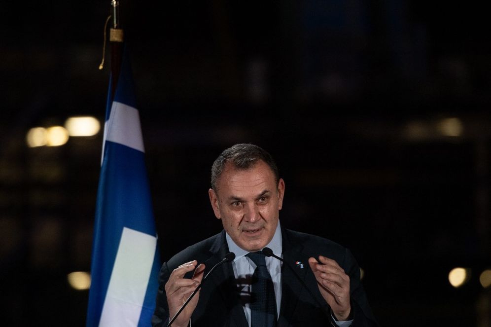 Greek Defense Minister Nikolaos Panagiotopoulos gives a speech during a visit to a shipyard at the Naval Group headquarters in Lorient, western France, on January 13, 2022.