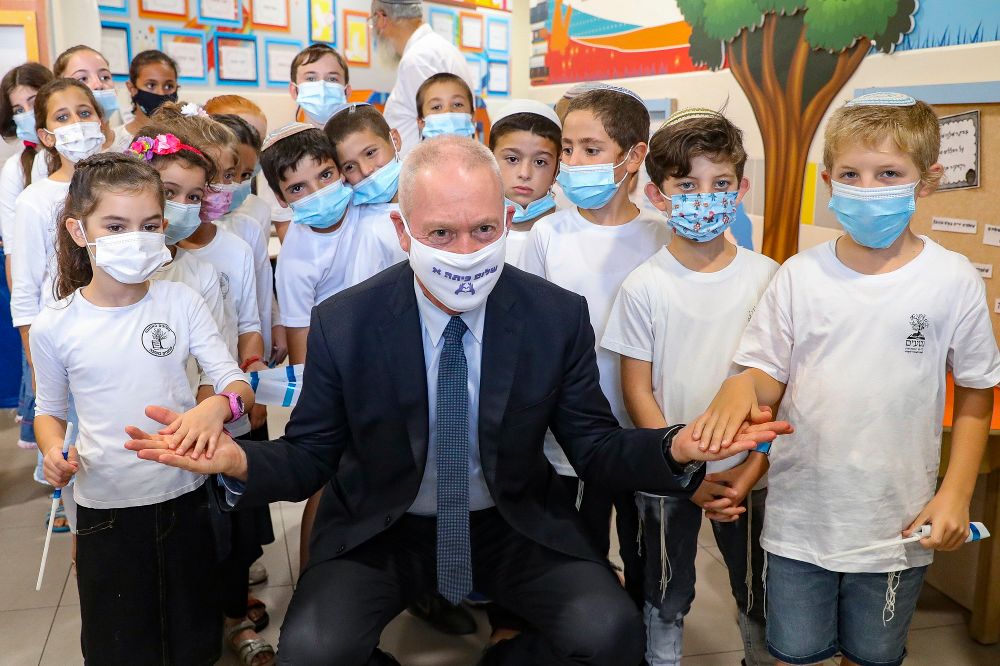 Education Minister Yoav Galant visits Israeli kids on the first day of the school year in Mevo Horon on September 1, 2020.