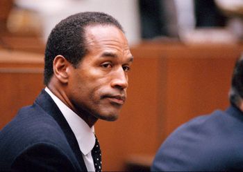 O.J. Simpson sits at his arraignment in superior Court in Los Angeles, July 22, 1994, where he pleaded "absolutely, 100 percent not guilty" on murder charges.