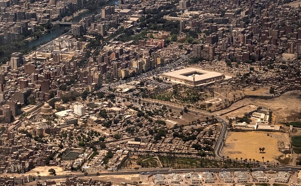 This picture taken on May 14, 2021 shows an aerial view of Egypt's capital Cairo's historic old Cairo district, showing the Mosque of Amr ibn al-Aas (the first mosque established in Egypt).