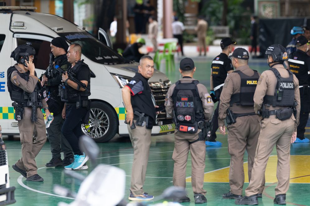 Police officers secure Debsirin Nonthaburi School, where a shooting killed several people in Thailand's Nonthaburi province, Friday, Aug. 7, 2026. 
