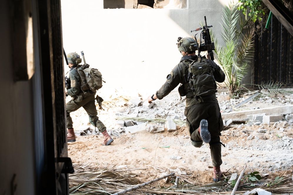 IDF combat soldiers maneuver in the Gaza Strip