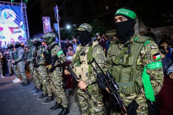Members of the Al-Qassam Brigades, the military wing of Palestinian organization Hamas, take part in a military festival organized by Hamas in Gaza City, on October 4, 2021.
