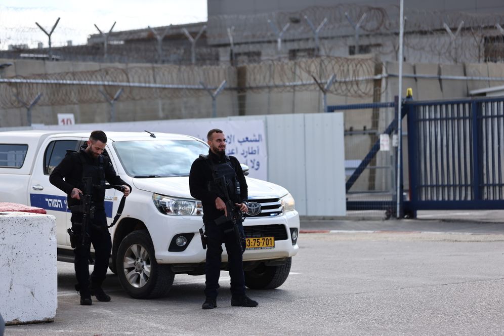 Police officers on duty outside Ofer prison