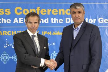 Head of the Atomic Energy Organization of Iran Mohammad Eslami (R) and International Atomic Energy Agency (IAEA) chief Rafael Grossi hold a press conference in Tehran