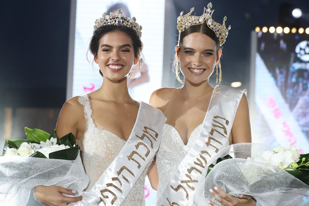 Karin Aliya (L) crowned Miss Israel 2016 with Yam Kasper Anshel in second place during the Tel Aviv beauty contest, on June 6, 2016.