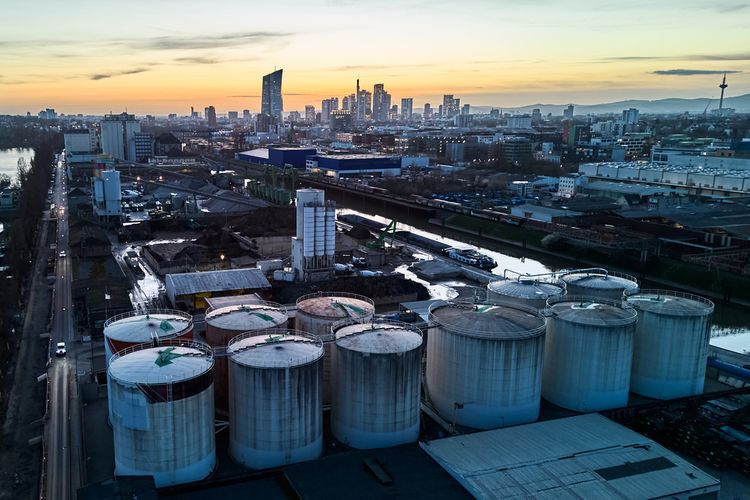 Oil tanks sit in a small harbor in Frankfurt, Germany, Thursday, March 12, 2026

