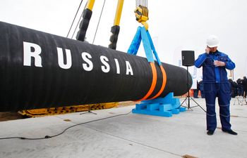 A Russian construction worker at a ceremony marking the start of Nord Stream pipeline construction in Portovaya Bay some 106 miles northwest of St. Petersburg, Russia, on April 9, 2010.