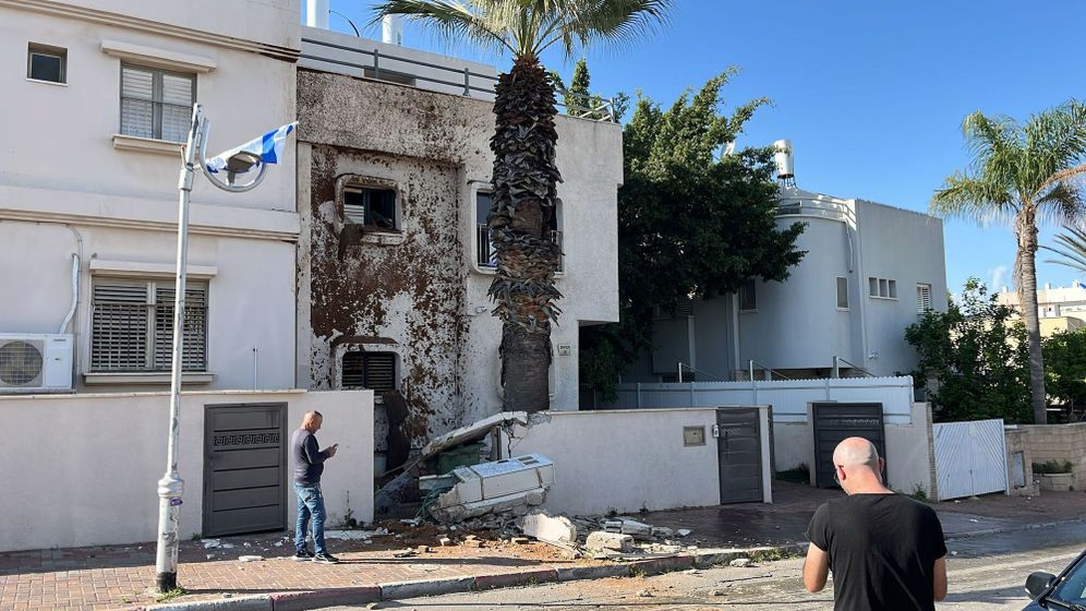 According to the Israeli copyright law 27A Impact in central Israel’s Holon after latest Iranian missile attack