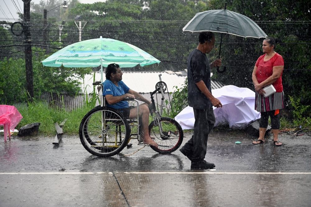 People shelter during Hurricane Eta in La Lima, Honduras, on November 4, 2020.