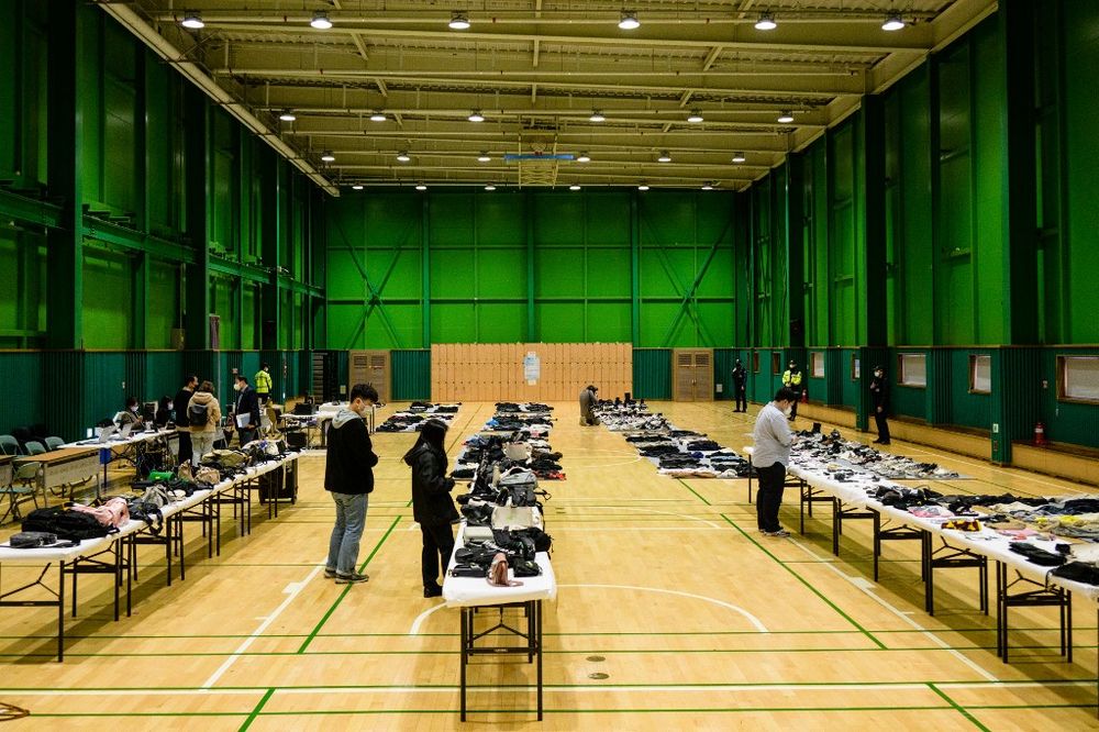 Personal belongings retrieved by police from the scene of a fatal Halloween crowd surge that killed more than 150 people in the Itaewon district are displayed at a gymnasium for relatives of victims to collect, in Seoul, South Korea, on November 1, 2022.