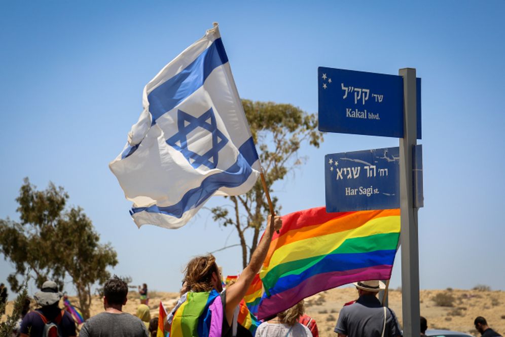Flash90 People participate in the first LGBT Pride parade in Mitzpe Ramon, Israel, on July 2, 2021.