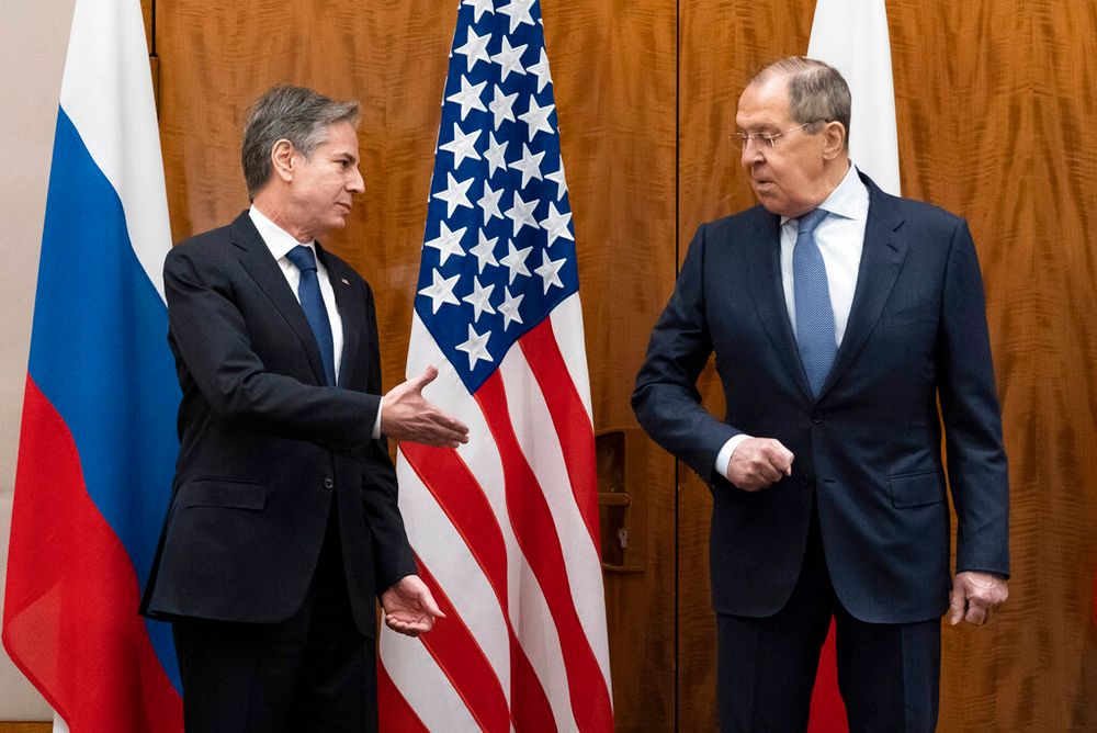 U.S. Secretary of State Antony Blinken (L) greets Russian Foreign Minister Sergei Lavrov in Geneva, Switzerland.
