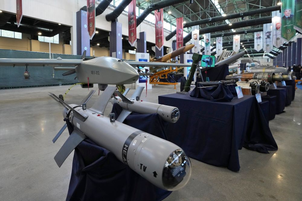 Iran's domestically built drones and weapons are displayed in an exhibition in a military compound belonging to the Defense Ministry, in Tehran