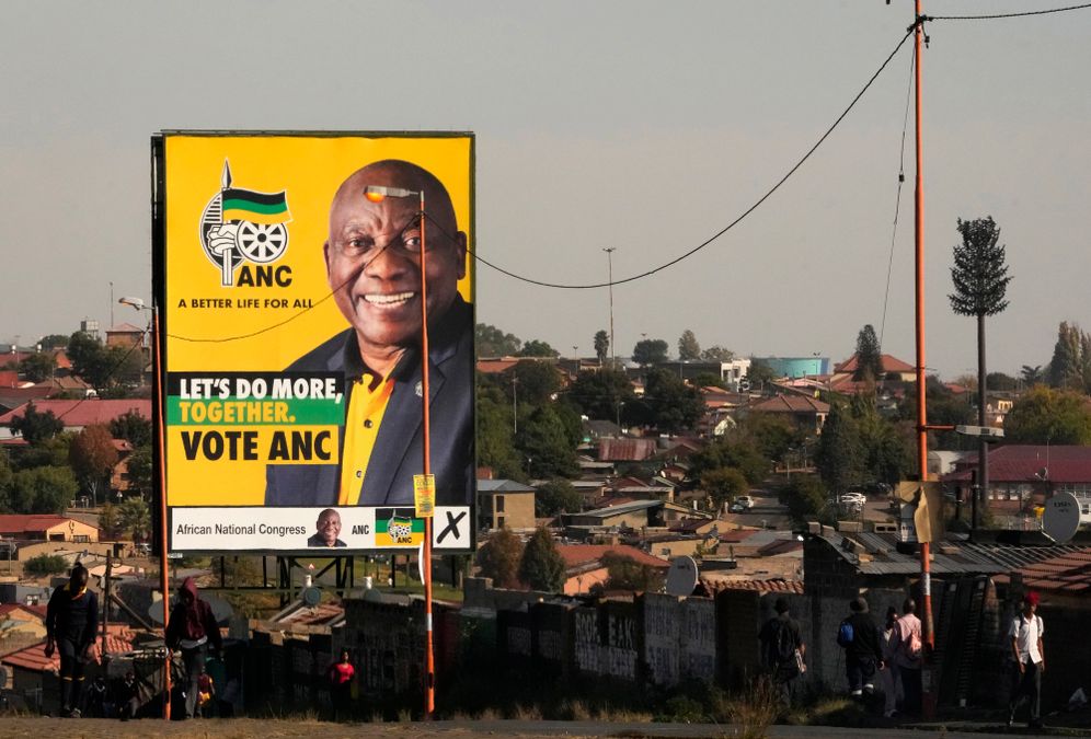 An election poster, with President Cyril Ramaphosa atop a pole in Soweto, South Africa