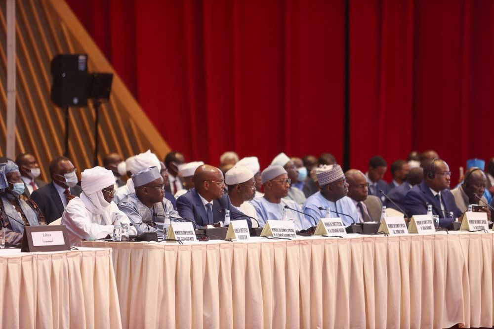 Participants listen to a speech as the Chad Peace Negotiations in Qatar's capital Doha, on March 13, 2022.