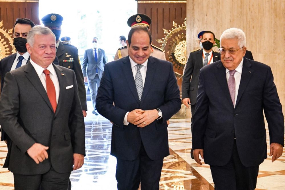 Egyptian President Abdel-Fattah al-Sisi, surrounded by the King of Jordan, Abdullah II, and the President of the Palestinian Authority Mahmoud Abbas, in Cairo, September 2, 2021.
