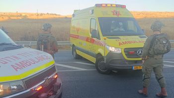Magen David Adom ambulances arrive at the scene of a terrorist attack near Hebron, the West Bank