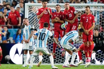 A free kick by Argentina's Lionel Messi (10) is blocked by Switzerland's Remo Freuler (8) and Granit Xhaka (10) during the World Cup quarterfinal soccer match in Kansas City, Mo., Saturday, July 11, 2026
