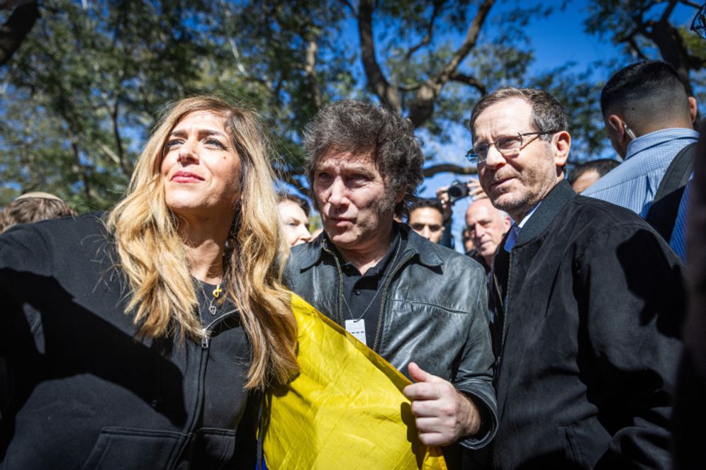 Argentinian President Javier Milei and Israeli President Isaac Herzog tour in Kibbutz Nir Oz, southern Israel, February 8, 2024.